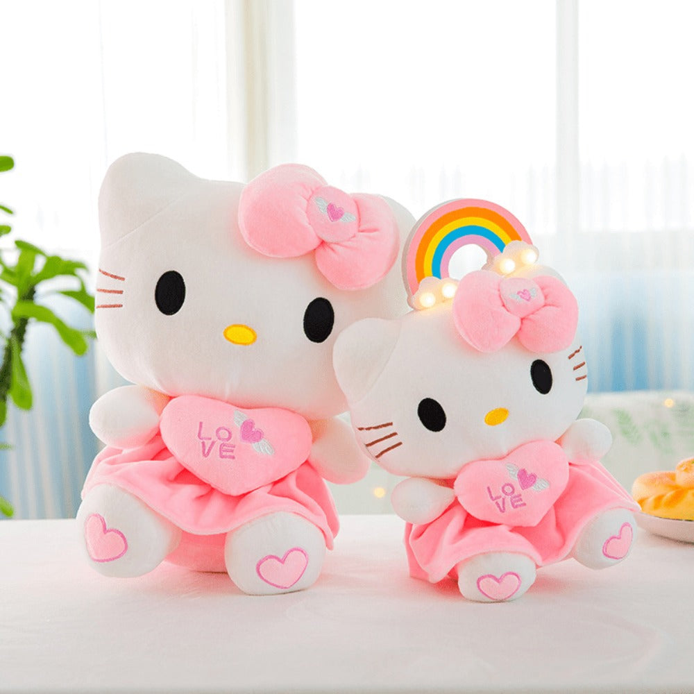 Hello Kitty Stuffed Animal Plush Doll Officially Licensed Sanrio β Pink White KT Cat Soft Cuddly Plush with Hugging Heart, Kawaii Collectible Gift for Girls Kids Teens Fans, Birthday Christmas Valentine
