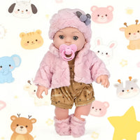 Pink clothes + doll + pacifier